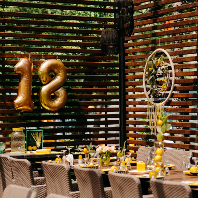 Evening event arrangement at Riveria by V Stays with lighting and seating