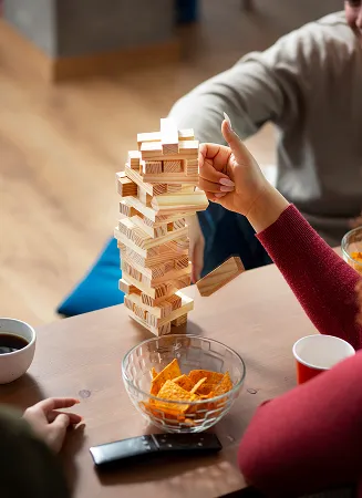 Jenga blocks game at Riveria by V Stays for fun group activity